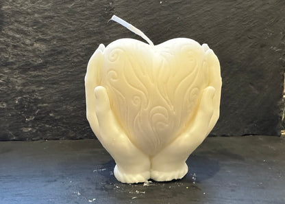 Heart in hands candle