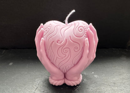 Heart in hands candle